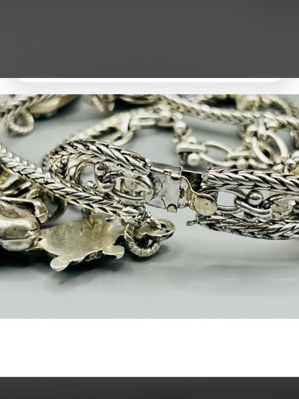 Silver Charm Bracelet with Heart and Decorative Charms